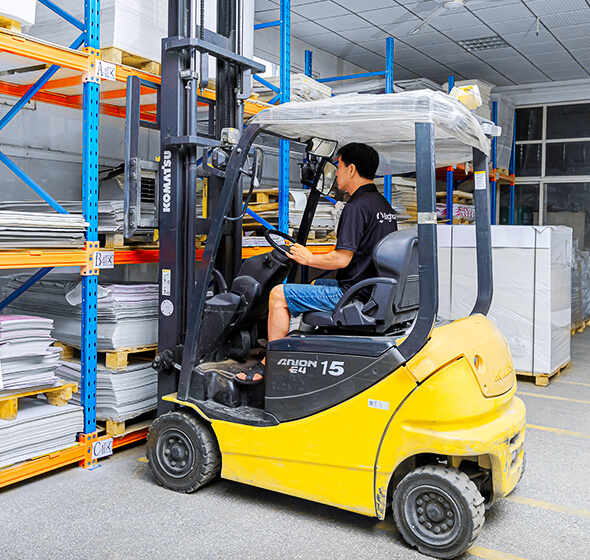 using forklift to move materials within Kinghorn's plant